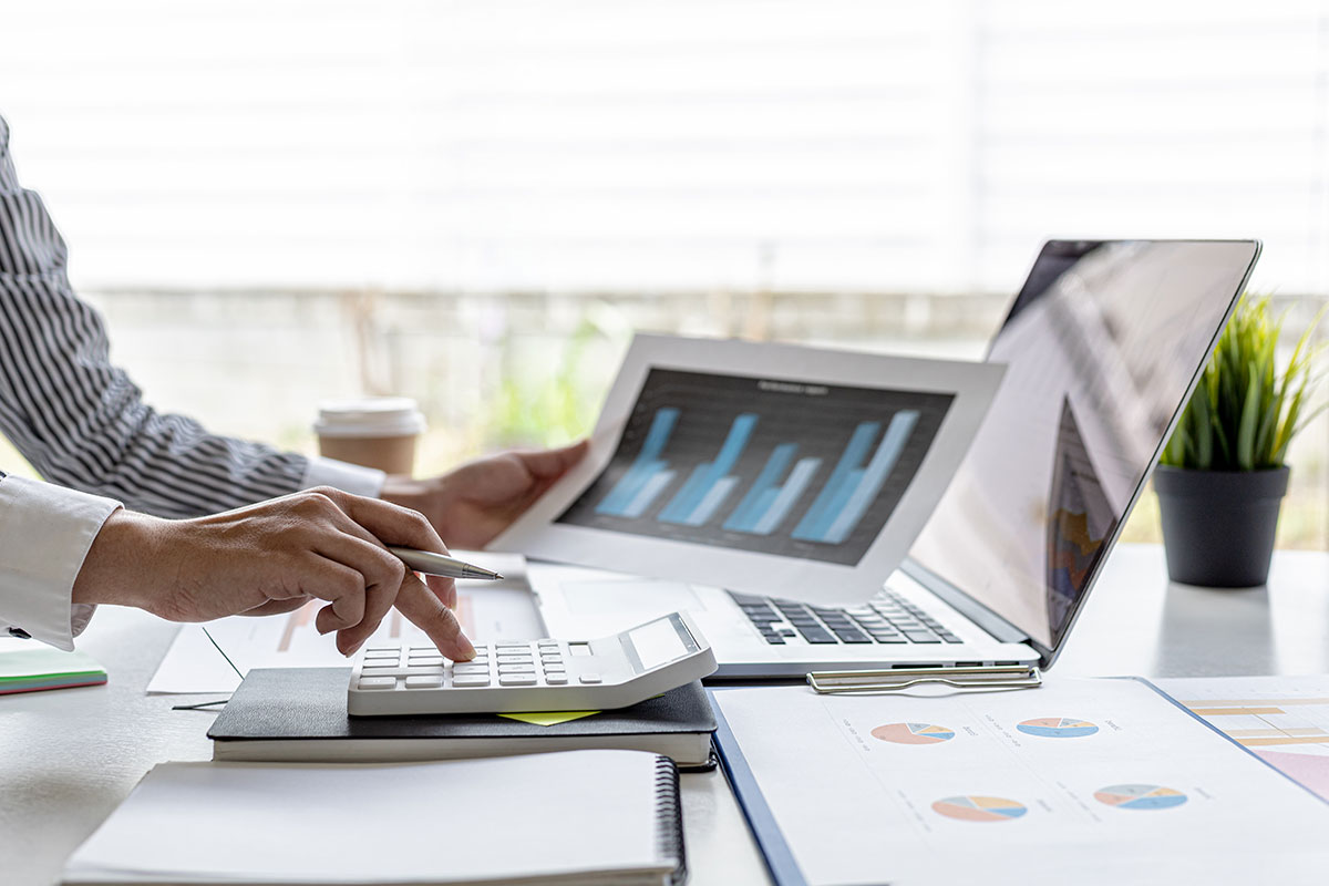 businessman-working-private-office-she-is-reviewing-company-s-financial-documents-sent-from-finance-department-before-he-takes-it-meeting-with-business-partner-financial-concept